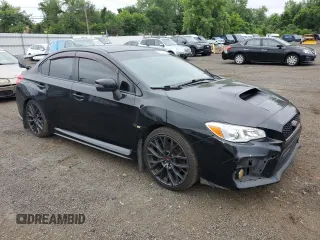 2017 Subaru WRX STI Limited with VIN JF1VA2Y60H9803265, listed as a Copart auction lot 64753225 with 129,768 mi miles and Salvage title. Bid and sale history available at DreamBid. Image 4.