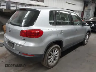2017 Volkswagen Tiguan S with VIN WVGBV7AX6HK042814, listed as a IAAI auction lot 41742587 with 89,086 mi miles and . Bid and sale history available at DreamBid. Image 4.