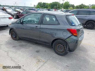 2015 Toyota Yaris L with VIN VNKJTUD32FA017299, listed as a IAAI auction lot 41862473 with 106,108 mi miles. Bid and sale history available at carsss.com. Image 3.