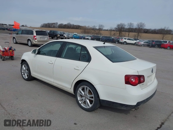 2008 Volkswagen Jetta Sedan S with VIN 3VWJZ71K58M075639, listed as a IAAI auction lot 41855222 with 142,902 mi miles. Bid and sale history available at carsss.com. Image 3.