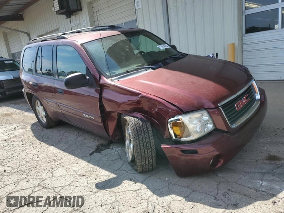 2004 GMC Envoy SLT with VIN 1GKDT13S542356597, listed as a Copart auction lot 71554904 with Not Provided miles and Clean Title. Bid and sale history available at DreamBid. Image 4.