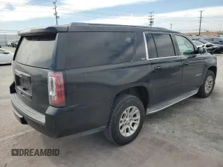 2015 GMC Yukon XL SLT with VIN 1GKS1HKC5FR218505, listed as a Copart auction lot 45708575 with 220,914 mi miles and Clean Title. Bid and sale history available at carsss.com. Image 3.