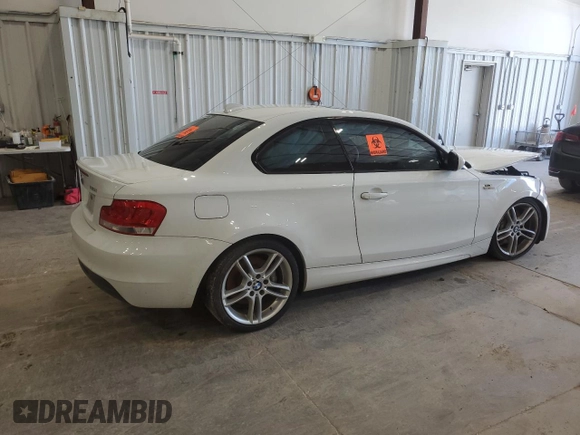 2013 BMW 1 Series 135i with VIN WBAUC9C52DVY60511, listed as a Copart auction lot 61339084 with Not provided miles and Non repairable. Bid and sale history available at DreamBid. Image 3.