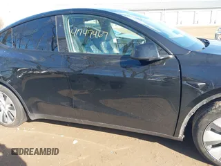 2024 Tesla Model Y with VIN 7SAYGDED5RF093018, listed as a IAAI auction lot 41747467 with 60,469 mi miles and . Bid and sale history available at DreamBid. Image 13.