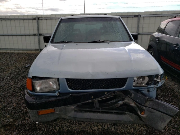 1992 Isuzu Rodeo z VIN 4S2CY58Z2N4333410, wystawiony jako Copart lot #74507154 z przebiegiem 264 327 mil mil oraz Szkody całkowita. Historia ofert i sprzedaży dostępna na DreamBid. Obrazek 5.