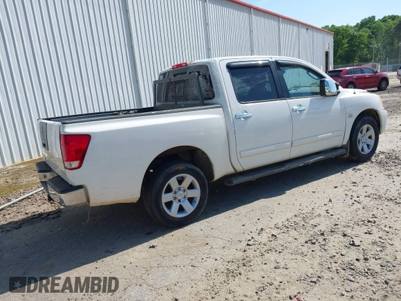 2004 Nissan Titan LE with VIN 1N6AA07AX4N534127, listed as a IAAI auction lot 42048092 with Not Provided miles. Bid and sale history available at carsss.com. Image 4.