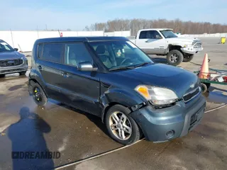 2011 Kia Soul + with VIN KNDJT2A2XB7248743, listed as a IAAI auction lot 41791749 with 242,408 mi miles. Bid and sale history available at carsss.com. Image 1.