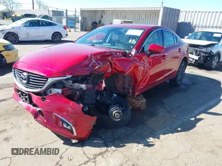 2016 Mazda 6 i Grand Touring с VIN JM1GJ1W50G1430328, выставлен на аукционе IAAI как лот 41879262 с пробегом 122 545 миль миль и . История ставок и продаж доступна на DreamBid. Изображение 19.