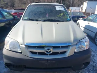 2006 Mazda Tribute i with VIN 4F2YZ92Z66KM10050, listed as a IAAI auction lot 41346153 with 139,668 mi miles and . Bid and sale history available at carsss.com. Image 12.