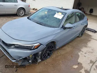 2024 Honda Civic Sport Touring z VIN 19XFL1G85RE004486, wystawiony jako IAAI lot #42052473 z przebiegiem 25 003 mil mil oraz . Historia ofert i sprzedaży dostępna na DreamBid. Obrazek 6.