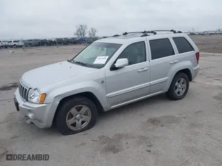 2007 Jeep Grand Cherokee Overland with VIN 1J8HR68237C676686, listed as a IAAI auction lot 42073411 with 194,524 mi miles. Bid and sale history available at carsss.com. Image 2.
