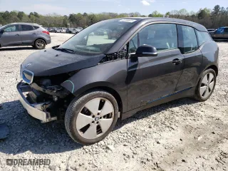 2015 BMW i3 with VIN WBY1Z4C5XFV278276, listed as a Copart auction lot 43206623 with 105,180 mi miles. Bid and sale history available at carsss.com. Image 1.