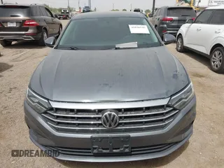 2021 Volkswagen Jetta S z VIN 3VWC57BU0MM032910, wystawiony jako IAAI lot #41836545 z przebiegiem 64 042 mil mil oraz . Historia ofert i sprzedaży dostępna na DreamBid. Obrazek 11.