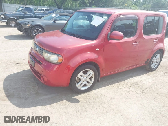 2009 Nissan Cube S z VIN JN8AZ28RX9T117772, wystawiony jako IAAI lot #42310747 z przebiegiem 147 582 mil mil oraz . Historia ofert i sprzedaży dostępna na DreamBid. Obrazek 2.