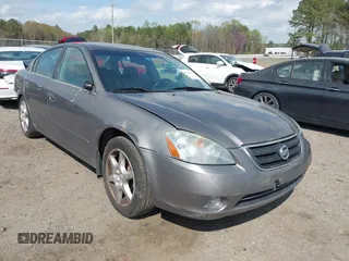 2003 Nissan Altima SE z VIN 1N4BL11DX3C331331, wystawiony jako IAAI lot #41908824 z przebiegiem 115 026 mil mil oraz . Historia ofert i sprzedaży dostępna na DreamBid. Obrazek 1.