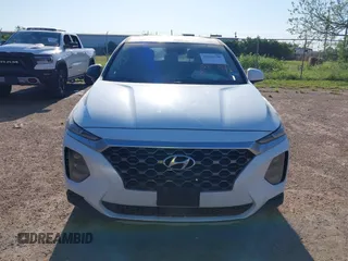 2019 Hyundai Santa Fe SE z VIN 5NMS23AD7KH058499, wystawiony jako IAAI lot #41963798 z przebiegiem Nie podano mil oraz . Historia ofert i sprzedaży dostępna na DreamBid. Obrazek 6.