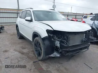 2022 Volkswagen Atlas SE z VIN 1V2WR2CA0NC515746, wystawiony jako IAAI lot #41877524 z przebiegiem 50 921 mil mil oraz . Historia ofert i sprzedaży dostępna na DreamBid. Obrazek 1.
