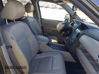 2015 Honda Pilot EX-L with VIN 5FNYF4H57FB007322, listed as a IAAI auction lot 41937314 with 298,739 mi miles and . Bid and sale history available at carsss.com. Image 5.