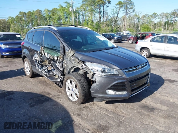 2016 Ford Escape Titanium with VIN 1FMCU9J94GUA63359, listed as a IAAI auction lot 41954514 with 94,315 mi miles. Bid and sale history available at carsss.com. Image 1.