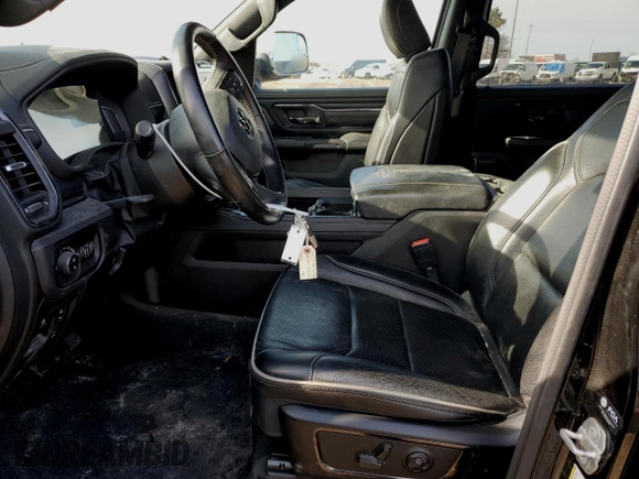 2023 Ram 1500 Limited with VIN 1C6SRFHT1PN530126, listed as a Copart auction lot 47220765 with 36,480 mi miles and Salvage title. Bid and sale history available at DreamBid. Image 7.