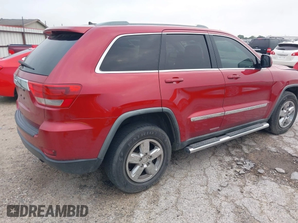 2011 Jeep Grand Cherokee Laredo with VIN 1J4RS4GG1BC673290, listed as a IAAI auction lot 42042557 with 147,590 mi miles and . Bid and sale history available at DreamBid. Image 4.