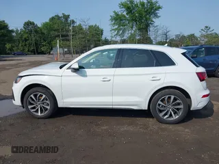 2021 Audi Q5 Premium Plus z VIN WA1BAAFYXM2050028, wystawiony jako IAAI lot #42479898 z przebiegiem 39 015 mil mil oraz . Historia ofert i sprzedaży dostępna na DreamBid. Obrazek 14.