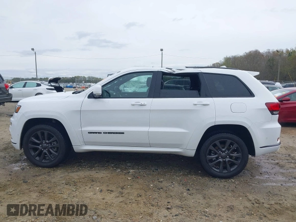 2019 Jeep Grand Cherokee High Altitude with VIN 1C4RJFCTXKC595552, listed as a IAAI auction lot 41877039 with 102,394 mi miles and . Bid and sale history available at DreamBid. Image 14.