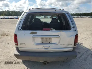 2000 Dodge Caravan SE with VIN 2B4GP45G0YR525310, listed as a Copart auction lot 69596394 with 299,957 mi miles and Salvage Title. Bid and sale history available at carsss.com. Image 6.