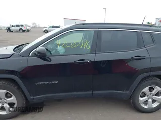 2018 Jeep Compass Altitude with VIN 3C4NJDBB9JT202297, listed as a IAAI auction lot 42020996 with 59,461 mi miles and . Bid and sale history available at DreamBid. Image 14.