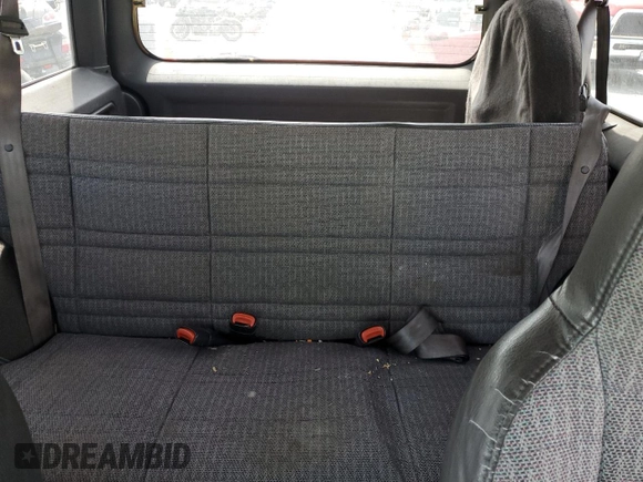 1999 Jeep Cherokee Sport with VIN 1J4FF68S2XL570795, listed as a Copart auction lot 61860585 with 320,467 mi miles and Salvage title. Bid and sale history available at DreamBid. Image 10.