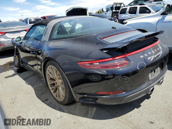 2019 Porsche 911 4S with VIN WP0BB2A99KS126019, listed as a Copart auction lot 60111334 with 25,012 mi miles and Salvage Title. Bid and sale history available at DreamBid. Image 2.