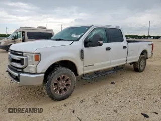 2020 Ford F-250 XL with VIN 1FT7W2BT9LED05780, listed as a Copart auction lot 60284965 with 130,941 mi miles and Salvage title. Bid and sale history available at DreamBid. Image 1.