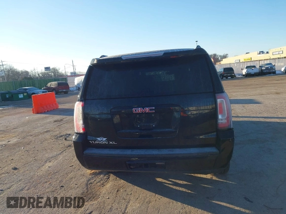 2015 GMC Yukon XL SLT with VIN 1GKS1HKC3FR250207, listed as a IAAI auction lot 41424234 with 183,233 mi miles. Bid and sale history available at carsss.com. Image 16.