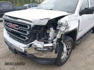 2016 GMC Sierra 1500 SLE z VIN 3GTU2MEC6GG227933, wystawiony jako IAAI lot #42026651 z przebiegiem 185 043 mil mil oraz . Historia ofert i sprzedaży dostępna na DreamBid. Obrazek 6.