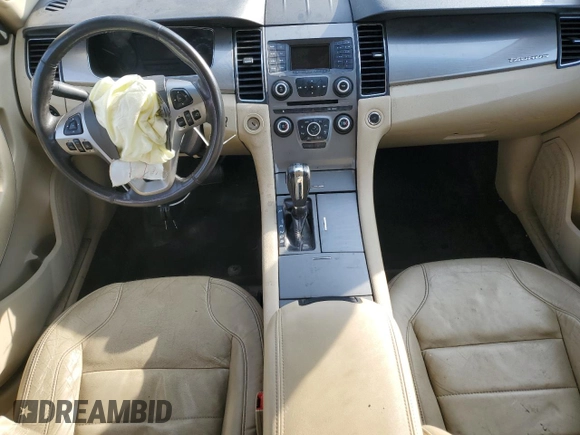 2014 Ford Taurus SEL z VIN 1FAHP2E88EG174797, wystawiony jako Copart lot #53961615 z przebiegiem Nie podano mil oraz Szkody całkowita. Historia ofert i sprzedaży dostępna na DreamBid. Obrazek 8.