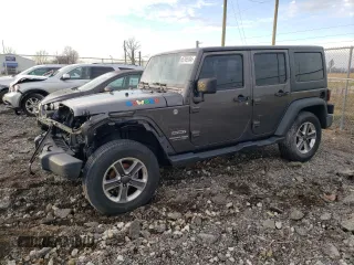 2018 Jeep Wrangler JK Unlimited Sport S with VIN 1C4BJWDG9JL882737, listed as a Copart auction lot 85765184 with 60,578 mi miles and Salvage Title. Bid and sale history available at carsss.com. Image 1.