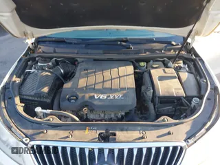 2013 Buick LaCrosse Touring with VIN 1G4GJ5E32DF162786, listed as a IAAI auction lot 41327452 with 221,117 mi miles and . Bid and sale history available at DreamBid. Image 10.