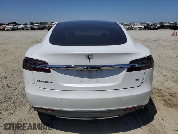 2014 Tesla Model S 60 with VIN 5YJSA1H19EFP58677, listed as a Copart auction lot 61446345 with 150,152 mi miles and Salvage title. Bid and sale history available at DreamBid. Image 6.