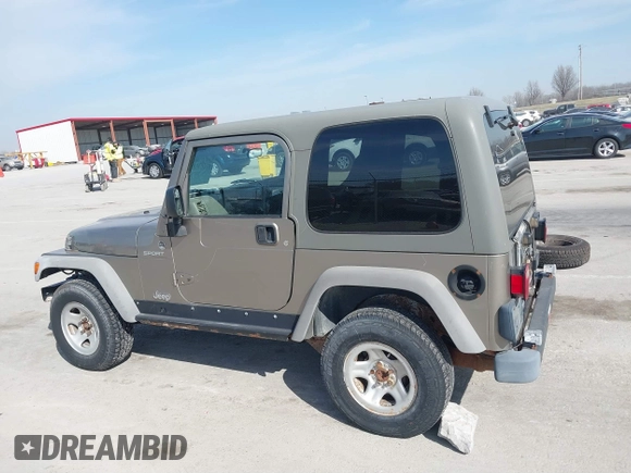 2006 Jeep Wrangler Sport Right Hand Drive with VIN 1J4F449S46P716520, listed as a IAAI auction lot 41763887 with 236,816 mi miles. Bid and sale history available at carsss.com. Image 14.