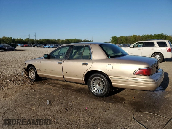 1997 Mercury Grand Marquis LS with VIN 2MELM75W3VX692074, listed as a Copart auction lot 52542335 with 211,850 mi miles and Salvage Title. Bid and sale history available at DreamBid. Image 2.