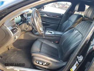 2018 BMW 7 Series 750i with VIN WBA7F0C5XJGM22674, listed as a Copart auction lot 74833524 with 0 mi miles and Salvage Title. Bid and sale history available at carsss.com. Image 7.