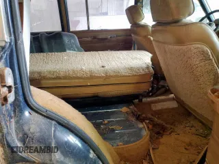 1986 Jeep Grand Wagoneer с VIN 1JCNJ15U5GT147524, выставлен на аукционе Copart как лот 57421255 с пробегом 112 292 миль миль и Списание • Salvage title. История ставок и продаж доступна на DreamBid. Изображение 10.