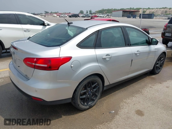 2016 Ford Focus SE with VIN 1FADP3F24GL295366, listed as a IAAI auction lot 42268573 with 71,462 mi miles and . Bid and sale history available at DreamBid. Image 4.