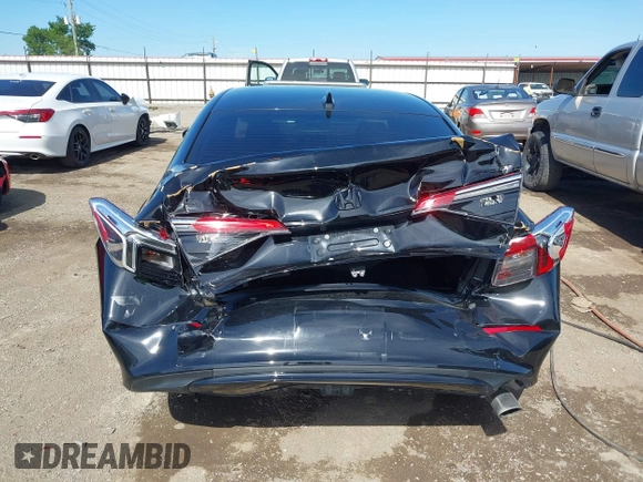 2023 Honda Civic Sport with VIN 2HGFE2F58PH557787, listed as a IAAI auction lot 42207827 with 51,885 mi miles and . Bid and sale history available at DreamBid. Image 6.