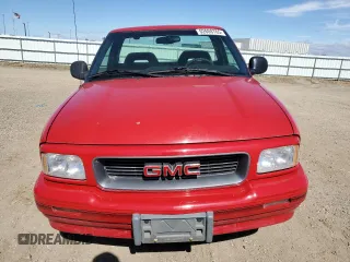 1995 GMC Sonoma z VIN 1GTCS144XS8524819, wystawiony jako Copart lot #52608765 z przebiegiem 84 794 mil mil oraz Szkody całkowita. Historia ofert i sprzedaży dostępna na DreamBid. Obrazek 5.
