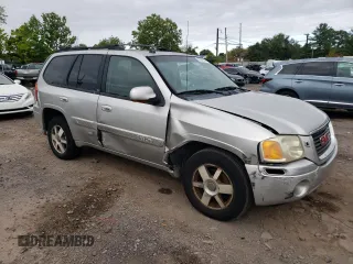 2005 GMC Envoy SLT with VIN 1GKDT13S252202866, listed as a Copart auction lot 70181524 with 169,603 mi miles and Salvage Title. Bid and sale history available at carsss.com. Image 4.
