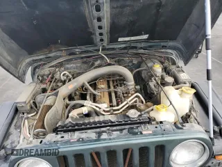 2002 Jeep Wrangler Sahara with VIN 1J4FA59S42P742978, listed as a Copart auction lot 46707685 with 77,272 mi miles and Salvage Title. Bid and sale history available at carsss.com. Image 11.