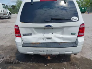 2012 Ford Escape XLT z VIN 1FMCU9DG2CKB18584, wystawiony jako IAAI lot #42469881 z przebiegiem 166 469 mil mil oraz . Historia ofert i sprzedaży dostępna na DreamBid. Obrazek 6.