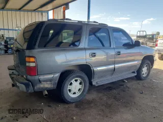 2001 GMC Yukon SLT z VIN 1GKEK13T21J165558, wystawiony jako Copart lot #52200565 z przebiegiem 291 699 mil mil oraz Szkoda całkowita • Salvage title. Historia ofert i sprzedaży dostępna na DreamBid. Obrazek 3.