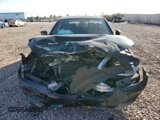 2018 BMW 7 Series 750i with VIN WBA7F0C57JGM23040, listed as a Copart auction lot 87392704 with 0 mi miles and Salvage Title. Bid and sale history available at carsss.com. Image 5.